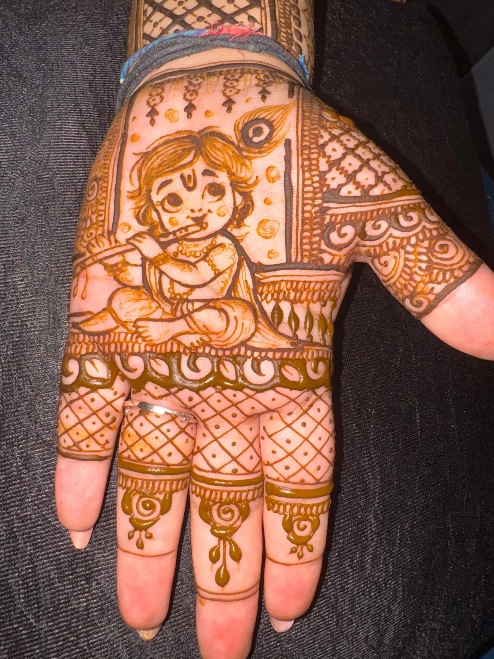 Baby Krishna Mehndi Design